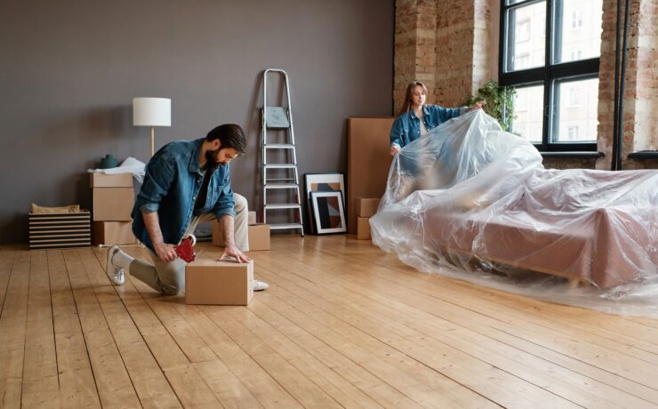 Couple Packing Furniture And Various Things
